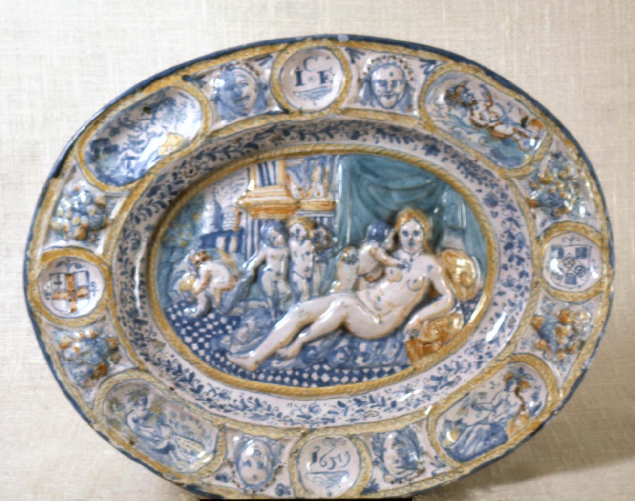 Painted plate with naked figures