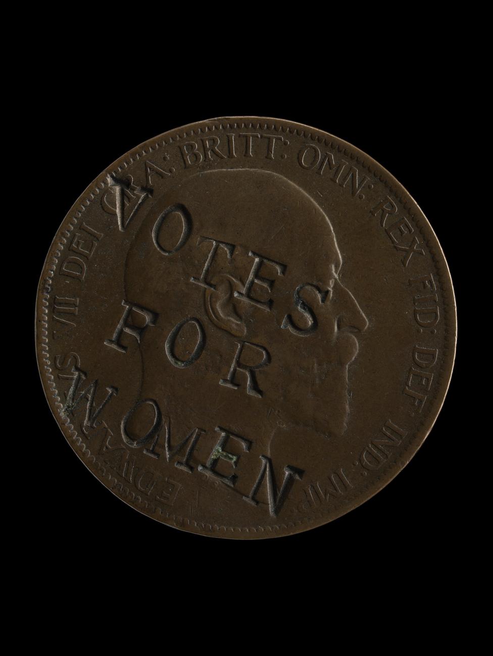 Penny defaced by suffragettes