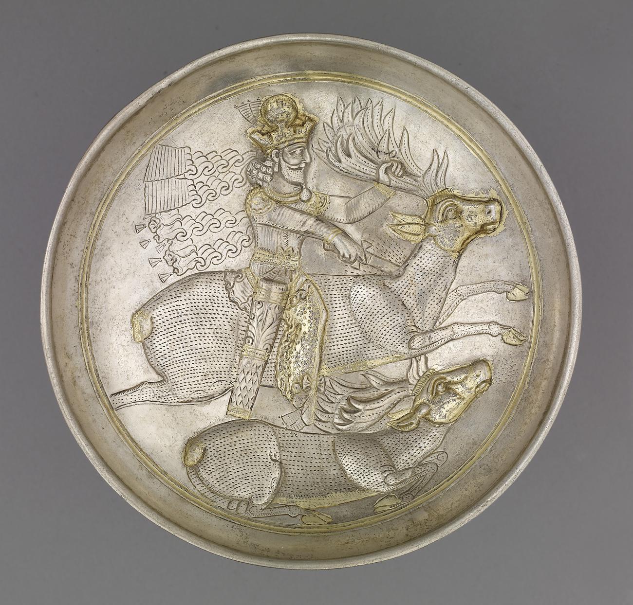 Silver plate of a lion hunt